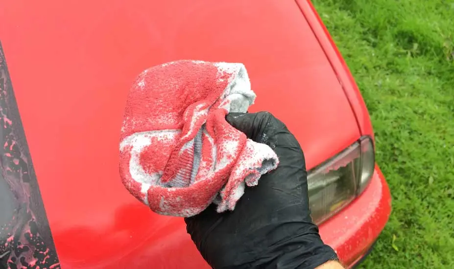 Polishing red car