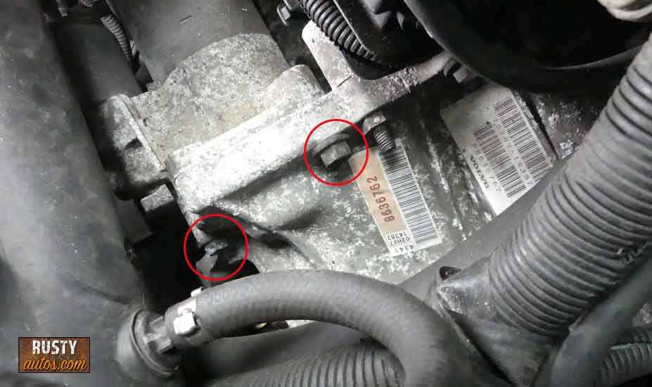 Remove starter motor bolts