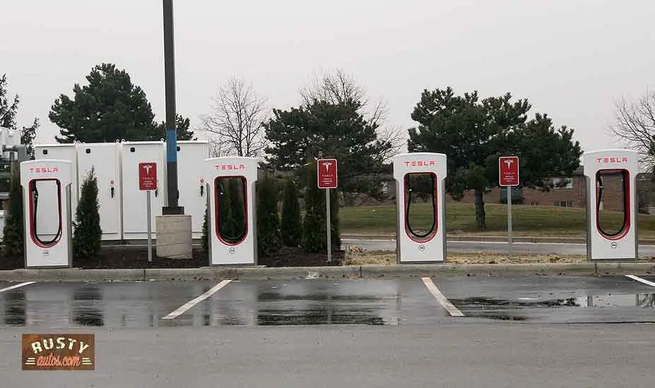 Empty Tesla charge station in rain