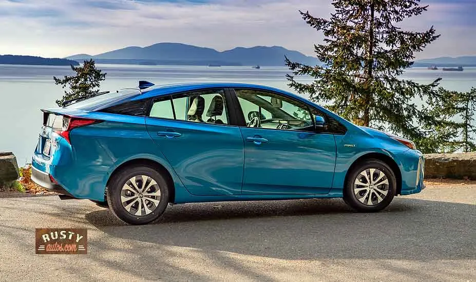 Prius parked in front of lake