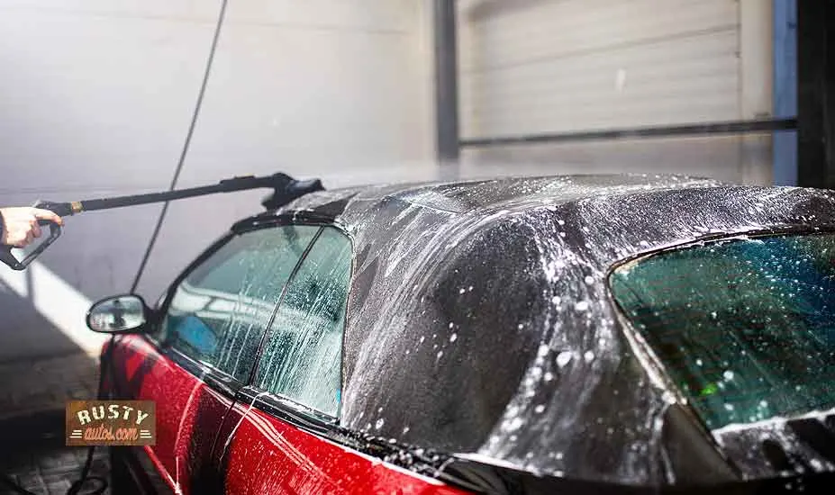 Soft top car in car wash